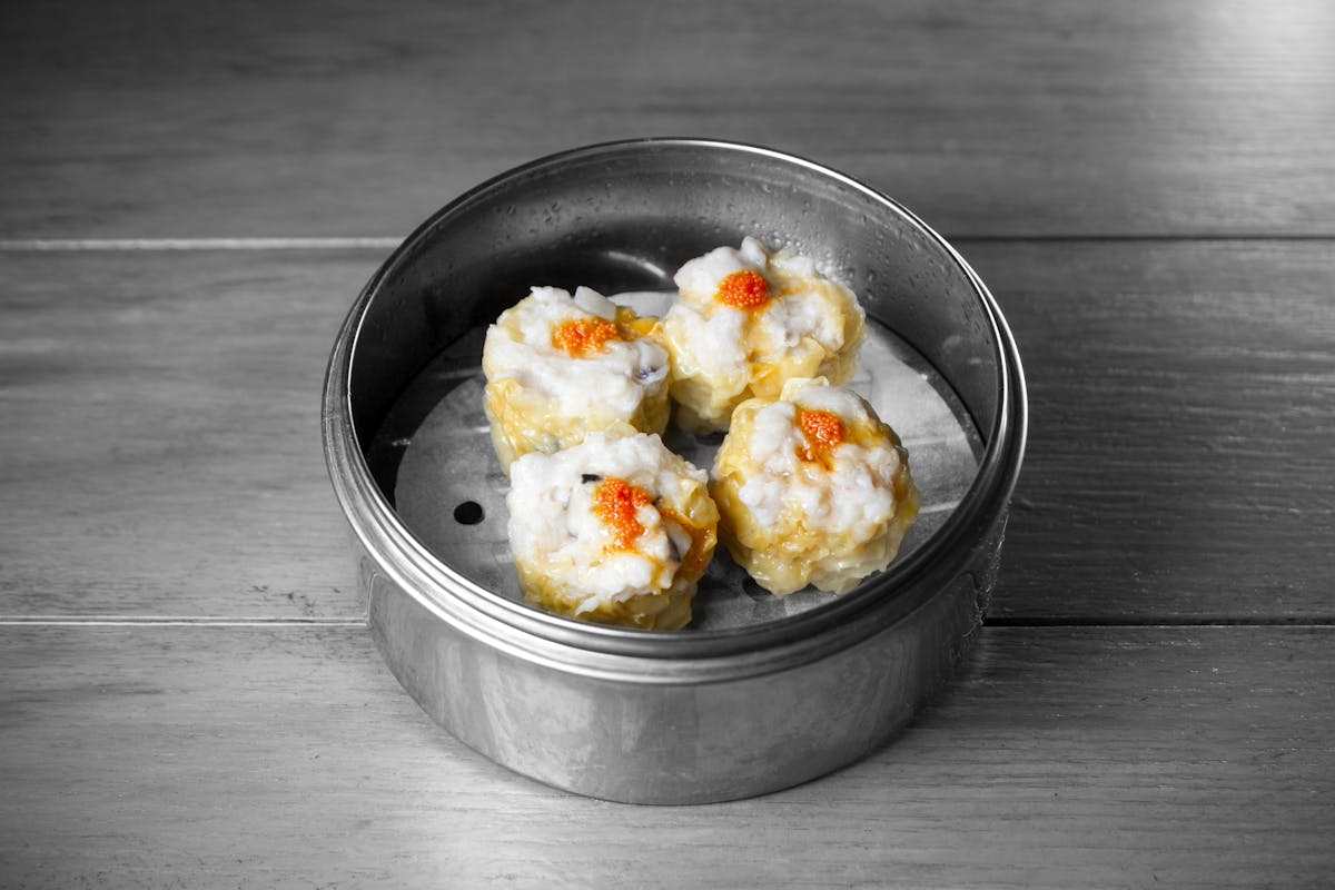 a bowl filled with small appetizers